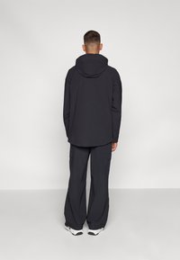 Ellesse BUSTED PANT - Bukse - black