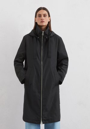 Black hooded parka jacket featuring a full zipper, two front pockets, and adjustable drawstrings on the hood. Smooth, non-reflective fabric.
