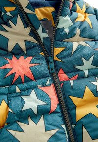 Next STANDARD - Ziemas jaka - teal blue star