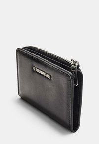 Black zippered wallet made from textured synthetic material. Features a silver logo and is rectangular with rounded edges.