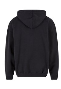 Black hoodie made of cotton, featuring a kangaroo pocket, ribbed cuffs and hem, and a drawstring hood. Simple, minimalist design.