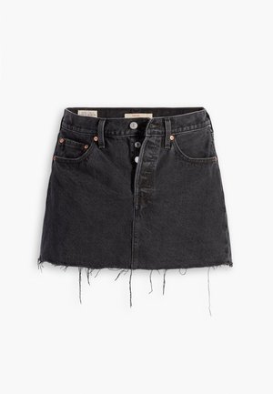 Czarna spódnica dżinsowa z postrzępionym dołem, z przodem na guziki i dwoma bocznymi kieszeniami. Posiada mosiężne okucia i dopasowany krój.