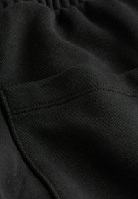 JOGGERS - REGULAR FIT - Trainingsbroek - black