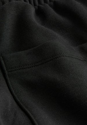 Self. JOGGERS - REGULAR FIT - Tracksuit bottoms - black