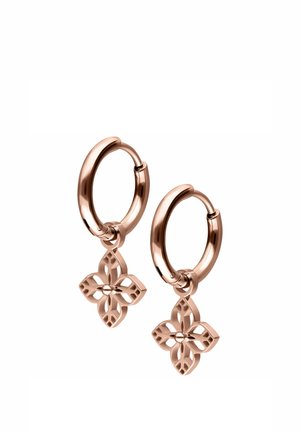 Rose gold hoop earrings with hanging four-petal floral charms featuring intricate cut-out patterns.