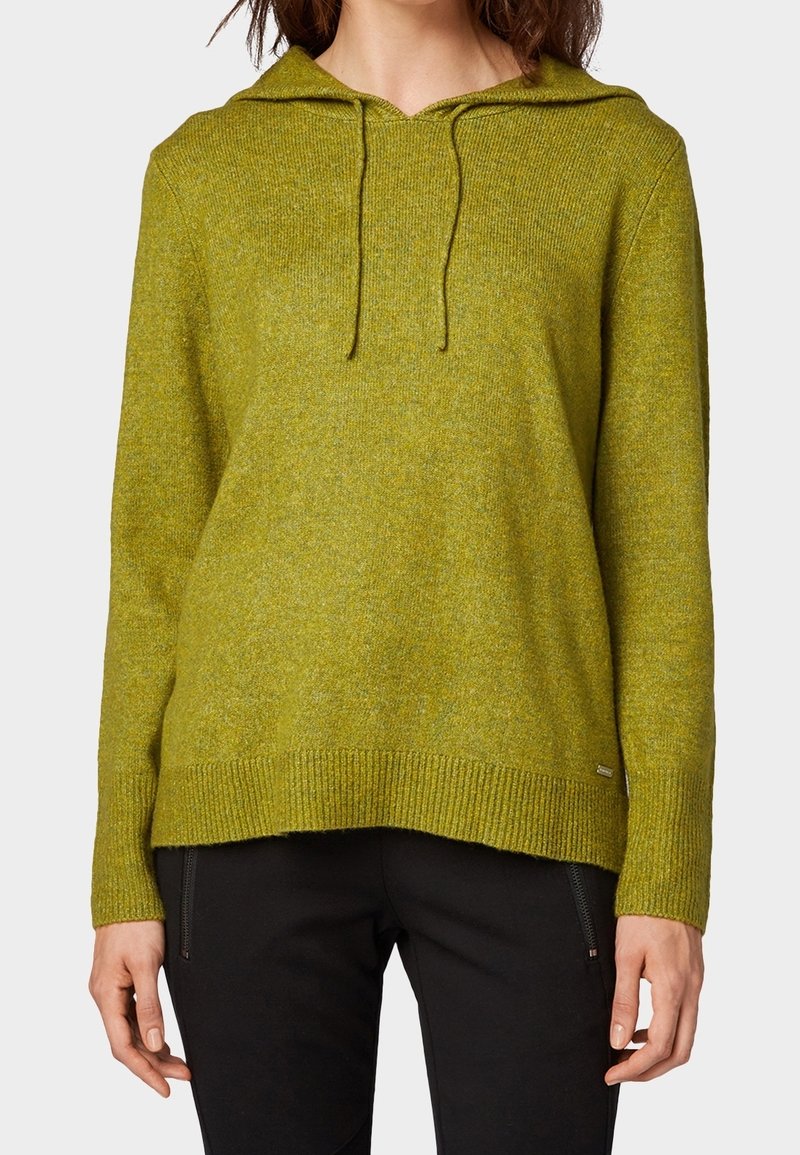 Grüner gestrickter Hoodie mit Kordelzug, gerippten Bündchen und Saum. Strukturierter Stoff, lässige Passform und leichte Farbvariationen im Verlauf.