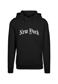 Fekete kapucnis pulóver, elülső zsebbel, húzókás kapucnival, fehér gótikus stílusú "New York" felirattal. Simaságú anyag, bordázott mandzsettákkal.