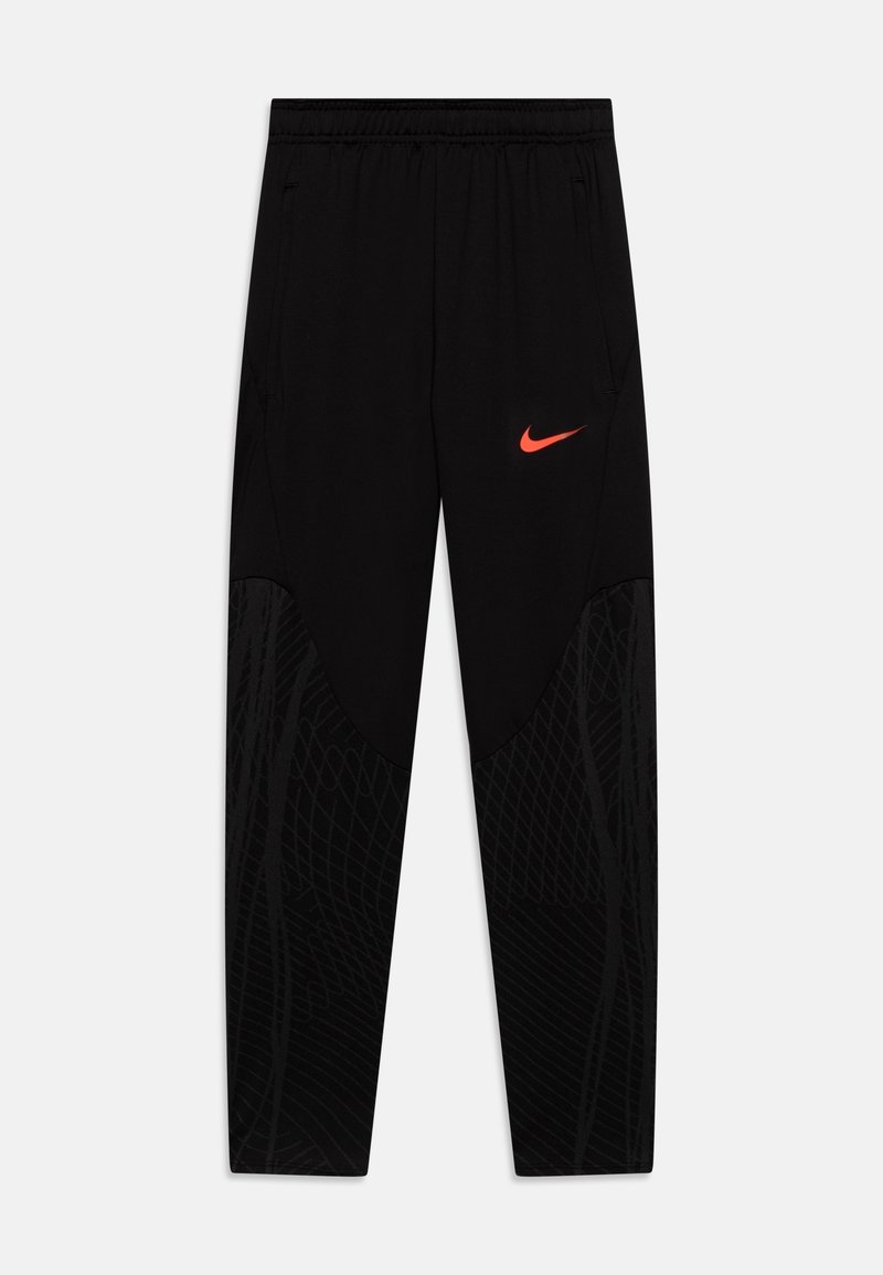 Black athletic pants with an elastic waistband, featuring a bright orange Nike logo and a textured black pattern on the lower legs.
