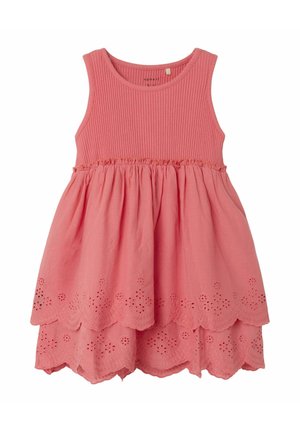 Rosa klänning med en ribbad överdel och en utsvängd, broderad kjol med vågiga kanter. Lättviktsmaterial, ärmlös design.