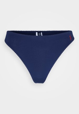 Navy blue bikini bottom made from soft material with scalloped edges. Features a small red logo on the front left.