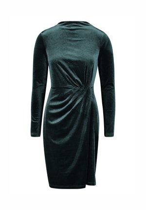 Grünes Samtkleid mit langen Ärmeln, das eine Drehung in der Taille und einen knielangen Schnitt aufweist. Weiche Textur und glatte Verarbeitung.