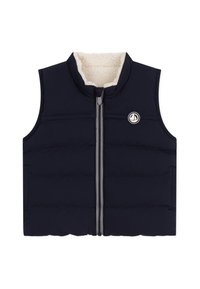 Temno modra puhasta jopa brez rokavov z zadrgo spredaj, z izbočeno flis podlogo in okroglim logotipom na prsih. Prešita zasnova.