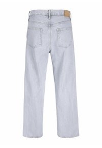 Jeans de pernera ancha en azul claro con una cintura alta, dos bolsillos traseros y una etiqueta de cuero marrón en la cintura. Tela texturizada.