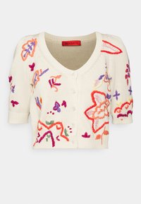 Krämfarbener Cardigan mit kurzen Ärmeln und buntem Blumenstickerei in Pink, Orange, Lila und Grün. Verfügt über einen tiefen V-Ausschnitt und einen Knopfverschluss.