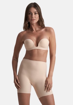 Nude strapless bra with smooth cups and a high-waisted shapewear bottom. Made of stretchy fabric with seamless design and a close fit.