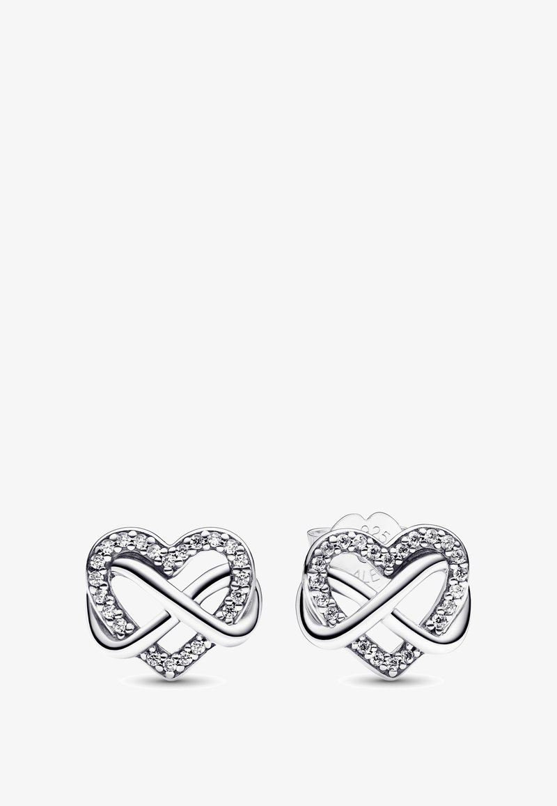 Boucles d'oreilles en argent en forme de cœur avec un design infini, ornées de petits cristaux transparents le long des bords, finition polie.