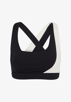 Mustmust ja heledate värvidega spordirinnahoidja, millel on ristkülikukujuline tagaosa. Valmistatud venivast materjalist, millel on sile tekstuur ja kontrastsed värvid.