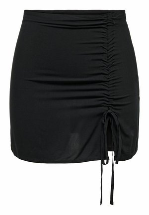 Zwarte mini-jurk van rekbaar materiaal, met zijruche en verstelbare strikjes aan de zoom voor variabele lengtes. Vloeiende textuur.