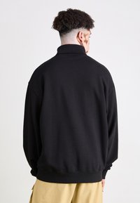 Carhartt WIP SCRIPT MOCKNECK - Melegítőfelső - black