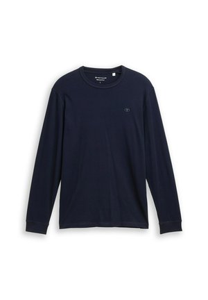 Camiseta de manga larga azul marino hecha de algodón suave, con un cuello redondo, dobladillos cosidos y un pequeño logo bordado en el pecho.