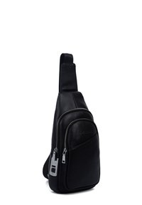 Black leather sling bag with two zippered compartments and an adjustable strap, set against a white background.