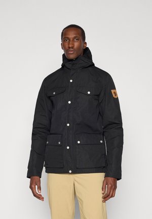 Black waterproof jacket with a hood, featuring two front pockets, snap buttons, and a leather logo patch on the left sleeve.