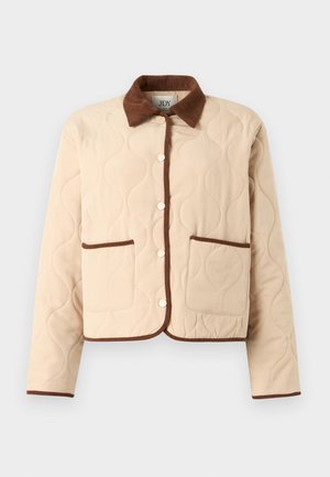 Beige gesteppte Jacke mit braunem Cordkragen, verfügt über Knopfverschlüsse und zwei Fronttaschen mit braunem Besatz entlang der Kanten.