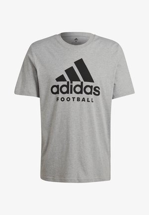 Maglietta in cotone grigia con logo Adidas nero e la scritta "Football" sottostante. Maniche corte e collo a giro.