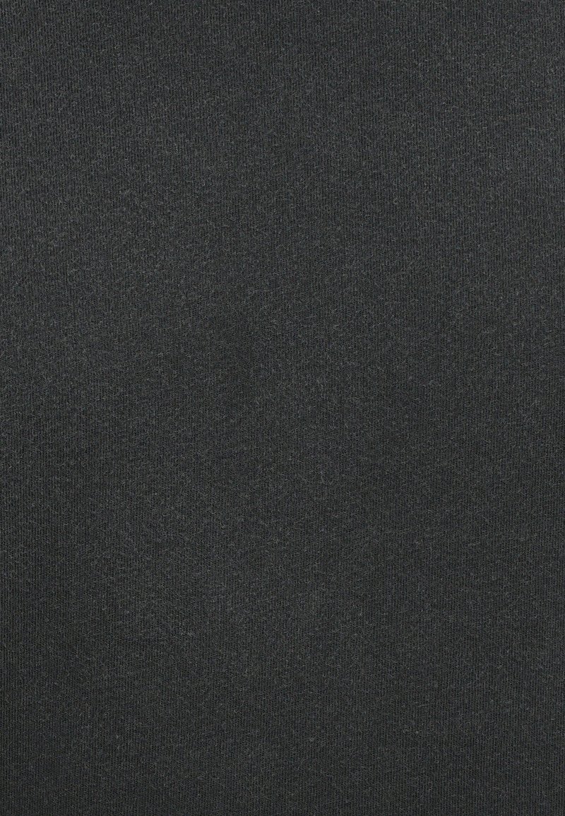 Black knit fabric with a smooth texture, displaying a consistent color and minimal variations. Suitable for various garment applications.