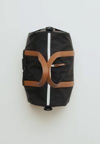 Herschel NOVEL UNISEX musta