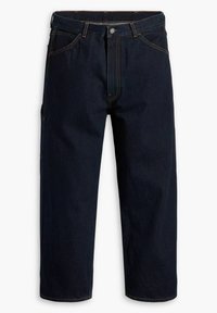 Mörkblå denimbyxor med avslappnad passform, med orange sömmar, knappgylf och två framfickor. Inga ytterligare dekorationer.