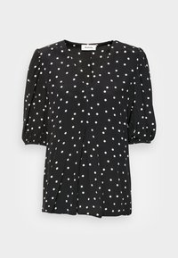 Blusa preta com bolinhas brancas. Apresenta um decote em V profundo, mangas bufantes e detalhe plissado na parte da frente. Feita de um tecido leve.