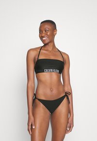 Calvin Klein Swimwear STRING SIDE TIE - Bikiinide alumine osa -  black
