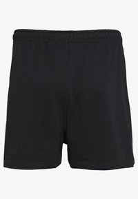 Svarta bomullsshorts med elastisk midja, med en mjuk textur och enkel design, lämpliga för avslappnat bruk eller sport.