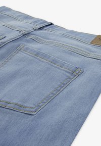 Abercrombie & Fitch HIGH RISE FLARE FLORAL - Jean bootcut - mottled light blue