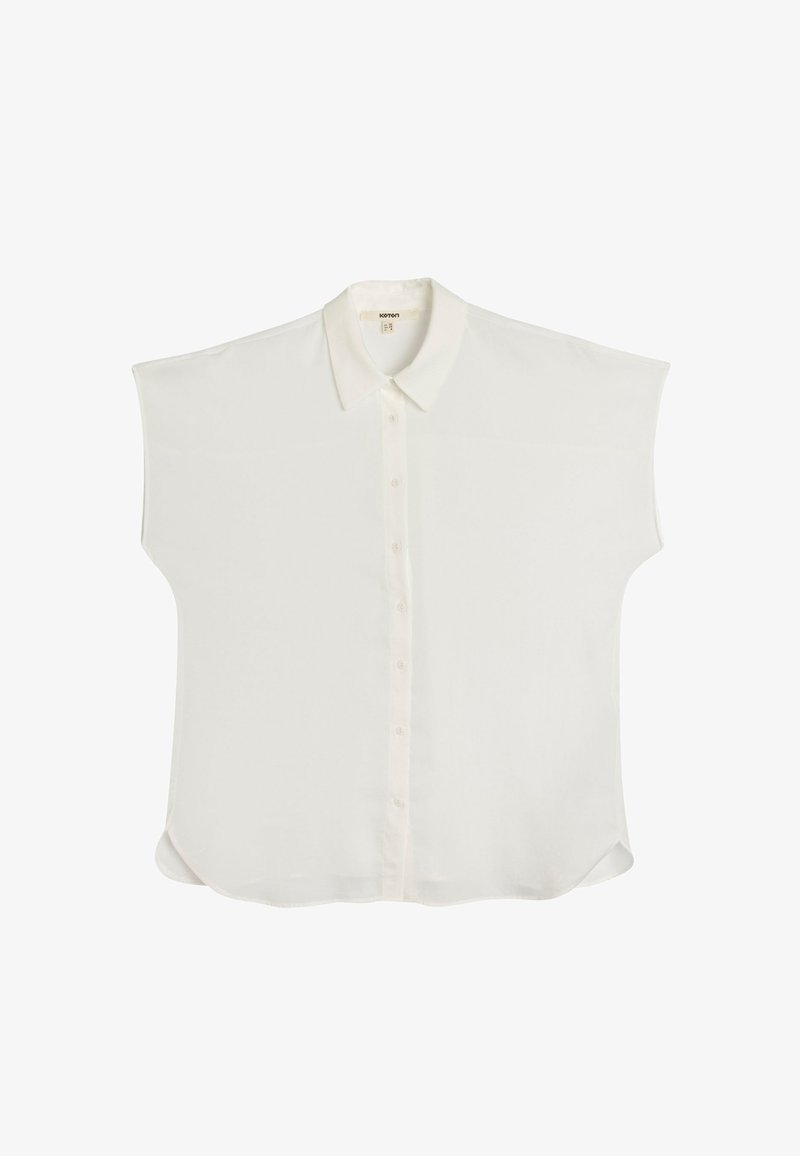 Witte blouse met korte mouwen, gemaakt van gladde stof, met een knoopsluiting aan de voorkant en een klassieke kraag. Ronde zoom en een relaxed fit.