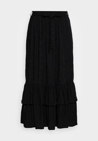 Jupe maxi noire à niveaux avec un tissu texturé, dotée d'une taille cintrée et d'un détail à nœud. Le design comprend des accents de bordure froncée.