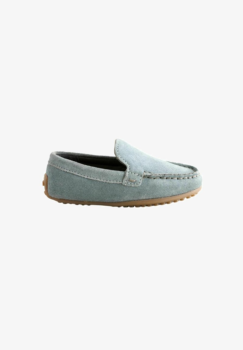 Light blue suede slip-on shoe with a rounded toe and stitched detailing, featuring a flexible rubber sole with small traction dots.