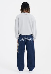 Ed Hardy SKULL SNAKE EAGLE TATTOO GRAPHIC - Jeansy Relaxed Fit