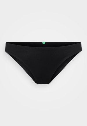 Zwarte bikini onderkant van soepele stof met een low-rise snit, met minimale stiksels en een klein groen label aan de achterkant.