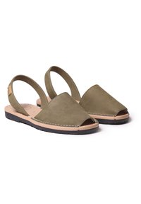 Olive green open-toe sandals made of suede with a beige leather sole, featuring a slingback strap and contrasting white stitching.