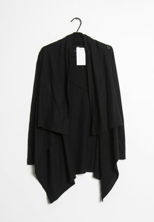 Neuletakki - black