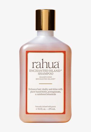 Shampoo Rahua Enchanted Island, 275 mL, presenta una bottiglia trasparente rosa, tappo dorato, etichetta bianca con bordo arancione e dettagli del prodotto stampati.