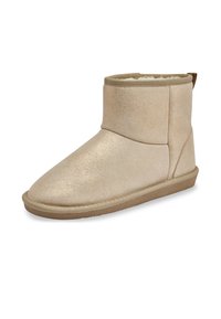 Botines beige hasta el tobillo hechos de ante brillante, con un suave forro interior, punta redonda y suela de goma plana con un pequeño tacón.