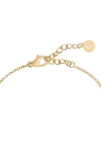 Kultainen ketjurannekoru hummerilukolla, jossa on pieni pyöreä tunniste. Ketjulla on herkkä tekstuuri ja säädettävä pituus.