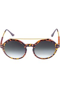 Ochelari de soare tortoiseshell cu rame rotunde, lentile gri degradé, accente aurii pe punte și vârfuri flexibile de culoare maronie.