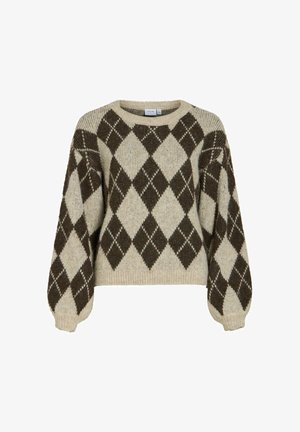 Megzta megztinis su kremine baze ir tamsiai ruda argilo raštu. Turi apvalią iškirptę ir pūstines rankoves, suteikiančias laisvumo įspūdį.