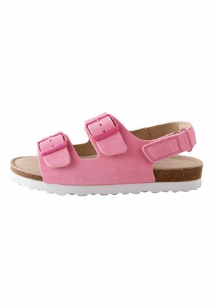 Rosa Wildleder-Sandale mit zwei verstellbaren Schnallen oben, Fersengurt, Kork-Fußbett und weißer, profillierter Sohle.