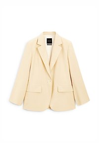 Jasnobeżowa marynarka z klapą z nacięciem, zapinana na pojedynczy guzik, z dwoma przednimi kieszeniami. Gładka tkanina, dopasowany krój i długie rękawy.