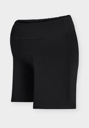 Shorts noirs longueur genou avec une large ceinture élastique froncée, en tissu lisse, présentés sur un fond clair uni.